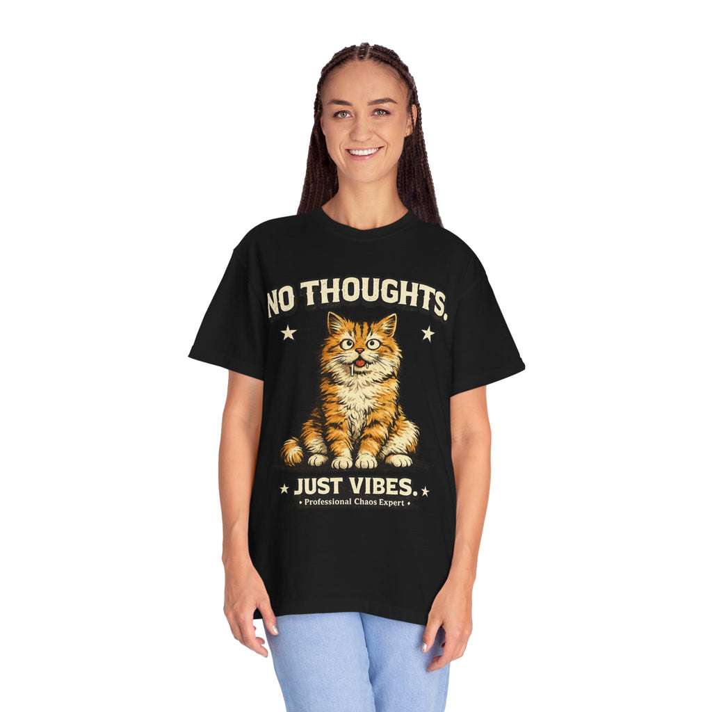 Funny orange cat graphic t-shirt featuring the "No Thoughts Just Vibes" design. Premium unisex tee for cat lovers, streetwear fans, and unique everyday style.