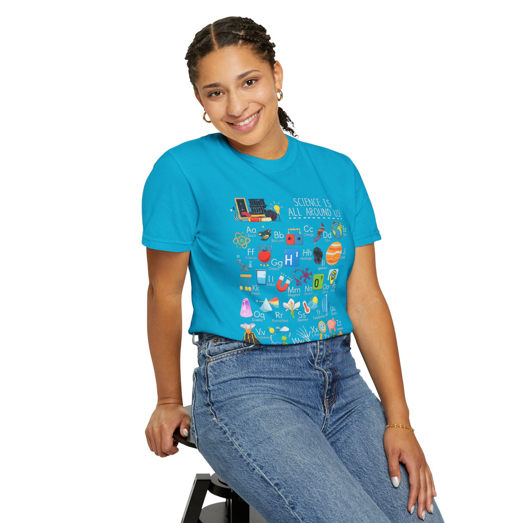 Black science alphabet graphic t-shirt with illustrated science icons from A to Z including atom, beaker, magnet and planets, premium cotton unisex tee for science teachers
