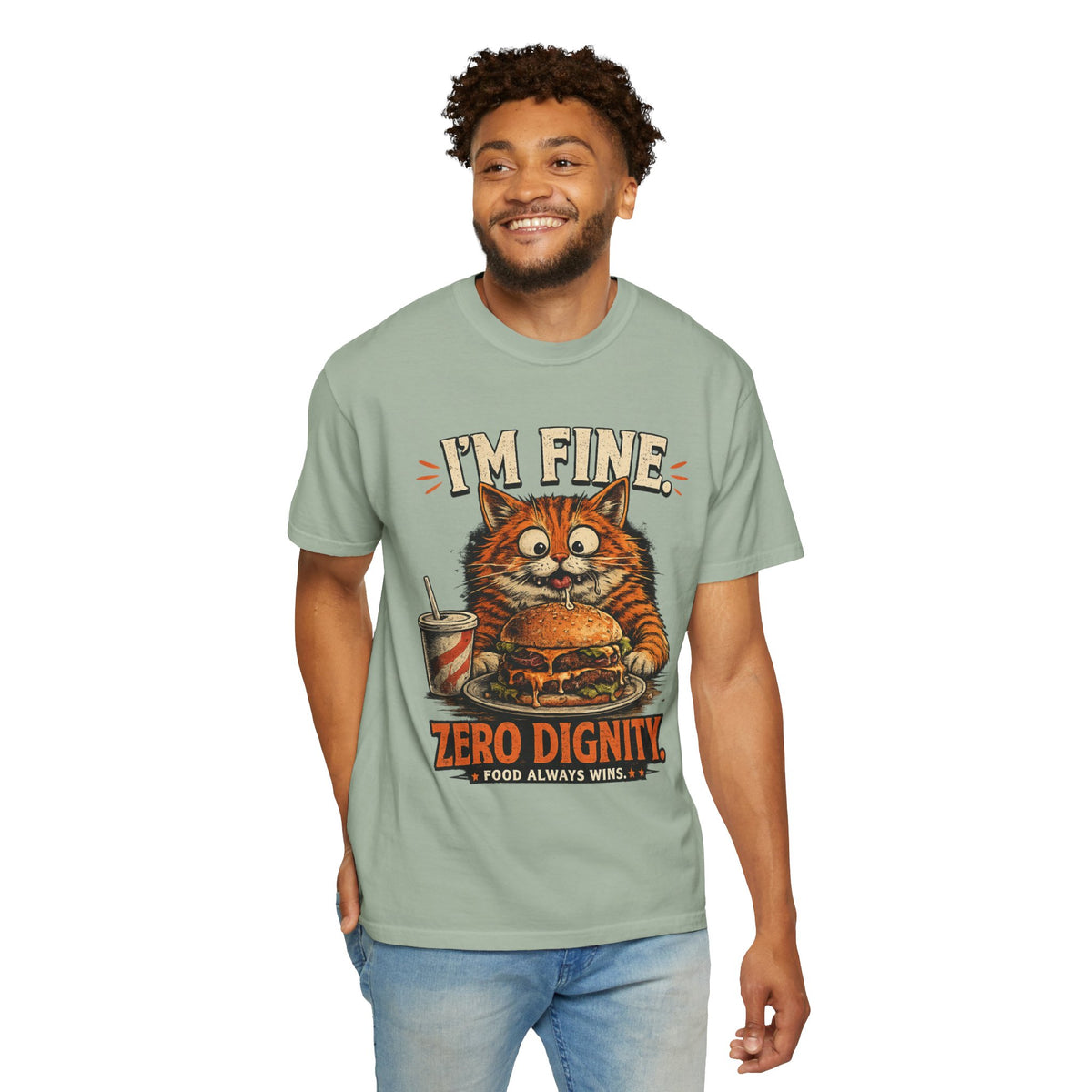 man wearing funny orange cat graphic t-shirt with "I'm Fine Zero Dignity Food Always Wins" text and cartoon cat eating a burger, vintage print on black premium cotton unisex tee